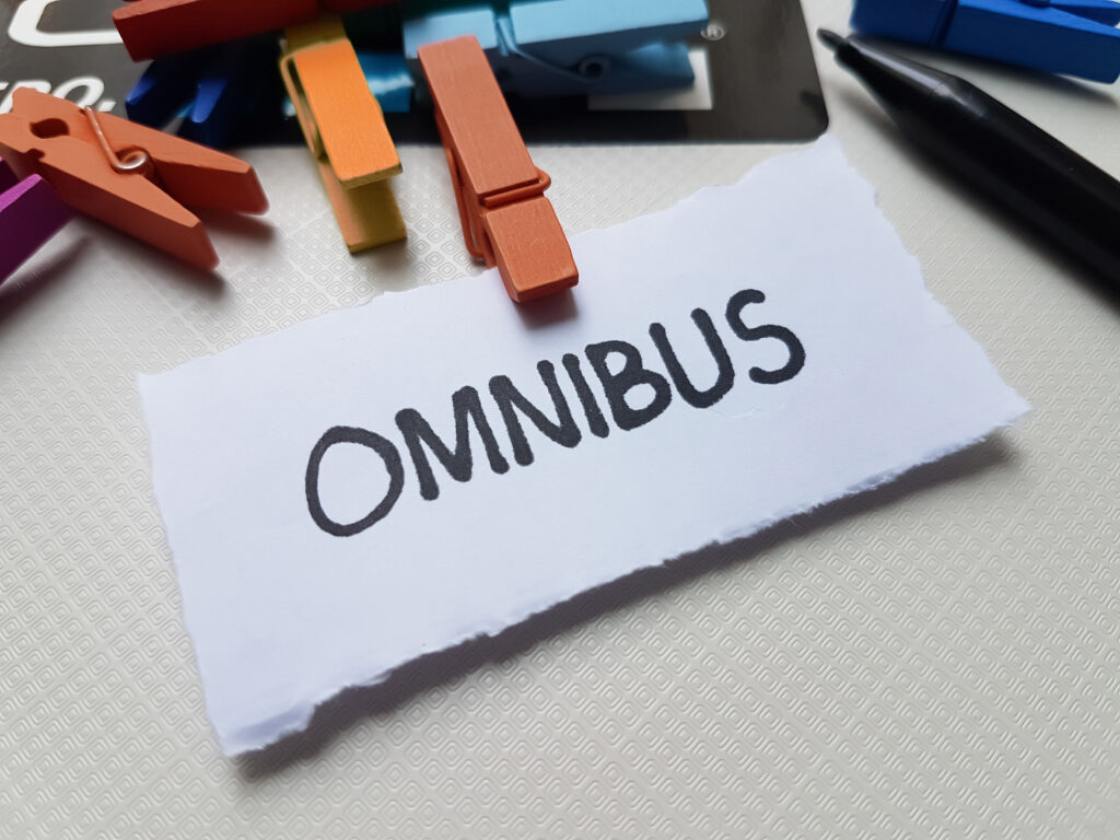 Omnibus writting on white background.